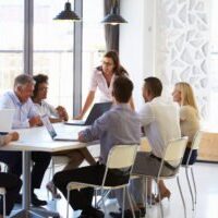 meeting in an office around a table